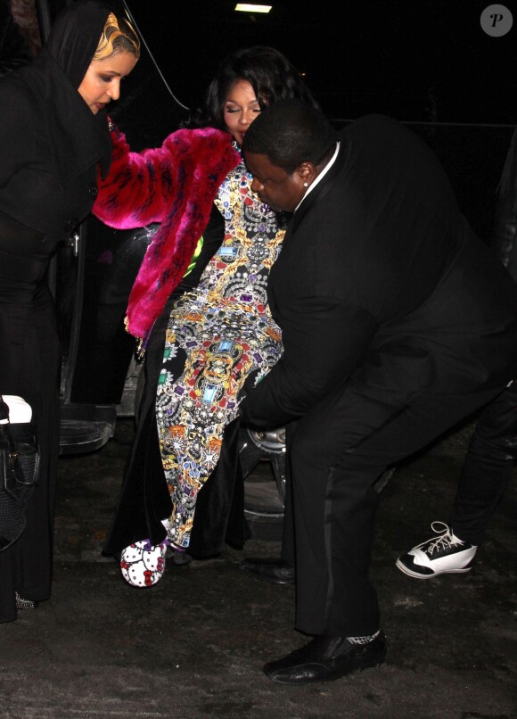 Lil Kim dévoile une grossesse surprise lors de la fashion week à New York, le 12 février 2014.