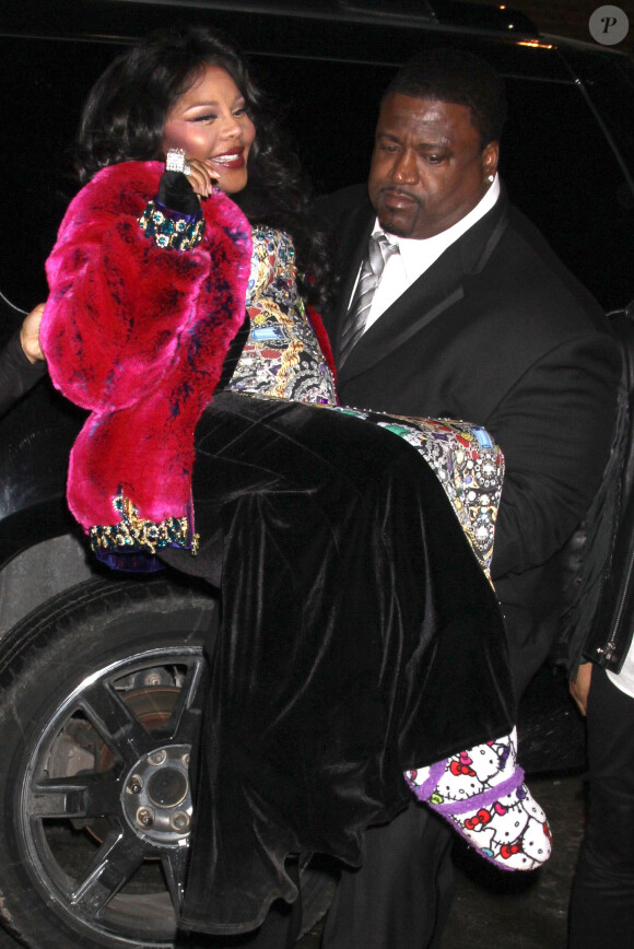 Lil Kim, enceinte, lors de la fashion week à New York, le 12 février 2014.
