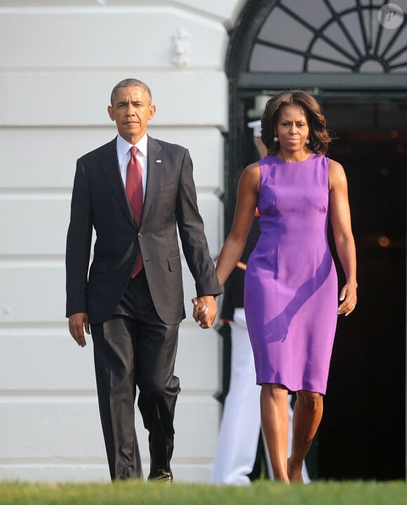 Barack Obama et la première dame Michelle Obama à la Maison Blanche lors du 12e anniversaire des attaques du 11 septembre le 11 septembre 2013