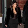 Kim Kardashian quitte l'appartement de son fiancé Kanye West à New York, le 16 février 2014.