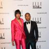 Helen Lasichanh et Pharrell Williams assistent aux ELLE Style Awards au One Embankment. Londres, le 18 février 2014.