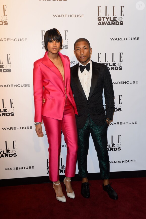 Helen Lasichanh et Pharrell Williams assistent aux ELLE Style Awards au One Embankment. Londres, le 18 février 2014.