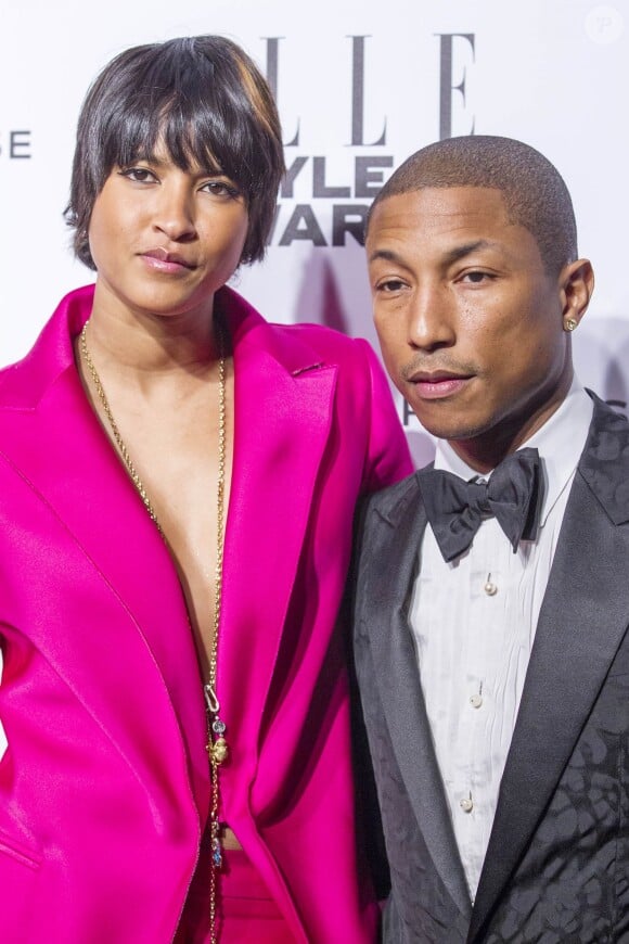 Helen Lasichanh et Pharrell Williams assistent aux ELLE Style Awards au One Embankment. Londres, le 18 février 2014.