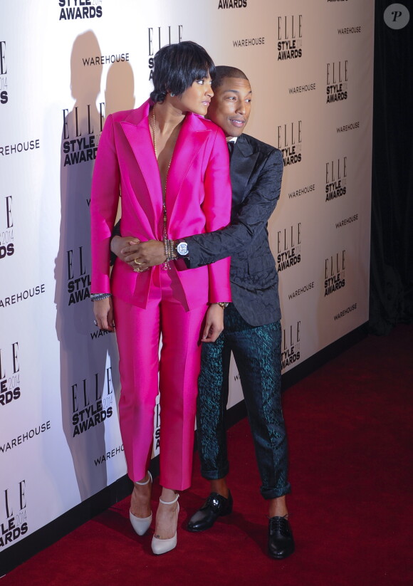 Helen Lasichanh et Pharrell Williams, tous deux vêtus en Lavin, assistent aux ELLE Style Awards au One Embankment. Londres, le 18 février 2014.