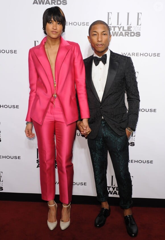 Helen Lasichanh et Pharrell Williams assistent aux ELLE Style Awards au One Embankment. Londres, le 18 février 2014.