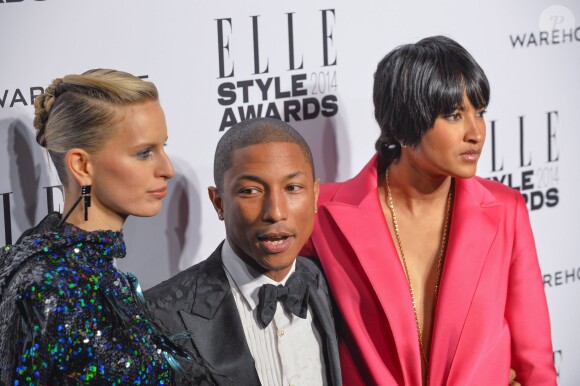 Karolina Kurkova, Pharrell Williams et Helen Lasichanh assistent aux ELLE Style Awards au One Embankment. Londres, le 18 février 2014.
