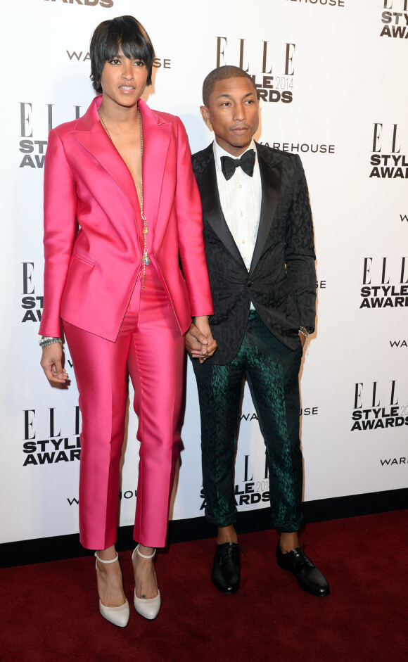 Helen Lasichanh et Pharrell Williams assistent aux ELLE Style Awards au One Embankment. Londres, le 18 février 2014.