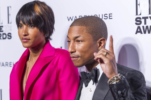 Helen Lasichanh et Pharrell Williams assistent aux ELLE Style Awards au One Embankment. Londres, le 18 février 2014.