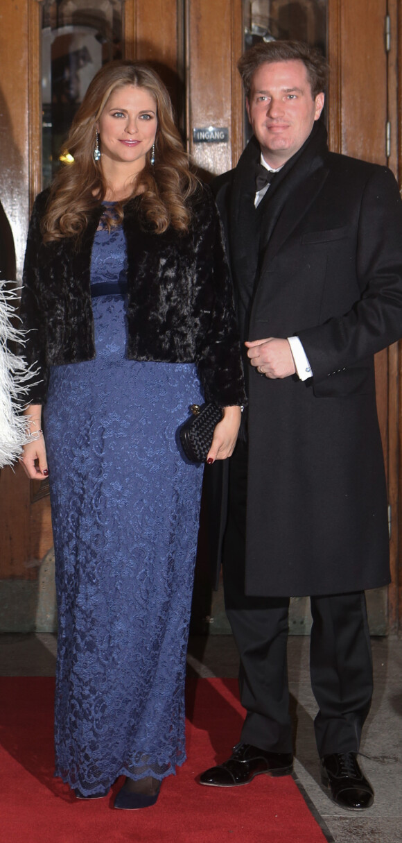 La princesse Madeleine de Suède (enceinte) et son mari Christopher O'Neill à Stockholm en Suède, le 19 décembre 2013.