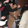 Kim Kardashian, surprise avec sa fille North à la sortie de l'appartement de son fiancé Kanye West. New York, le 25 février 2014.