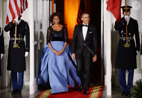 Barack Obama et Michelle Obama lors d'un dîner d'état au North Portico de la Maison Blanche à Washington, le 11 février 2014