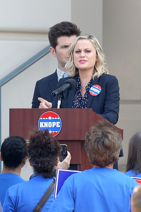 Amy Poehler gets into character as newly-elected City Councilwoman, Leslie Knope, on the set of "Parks and Recreation" in Pasadena. Adam Scott, who plays Amy's onscreen husband, was also there supporting her from a close distance. In between takes, Amy and Adam snacked on some sandwiches. The hit show will premiere its new season on September 26 on NBC. Los Angeles, CA, USA, September 11, 2013. Photo by GSI/ABACAPRESS.COM12/09/2013 - Los Angeles