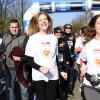 Natalia Vodianova, enceinte, au départ du Semi-Marathon de Paris pour l'association Naked Heat Foundation le 2 mars 2014