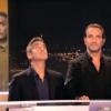 George Clooney et Jean Dujardin miment la descente d'ascenseurs avant de tourner une interview pour le journal télévisé de TF1.