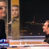 George Clooney hilare devant Jean Dujardin mimant la descente en escalateur avant de tourner une interview pour le journal télévisé de TF1.