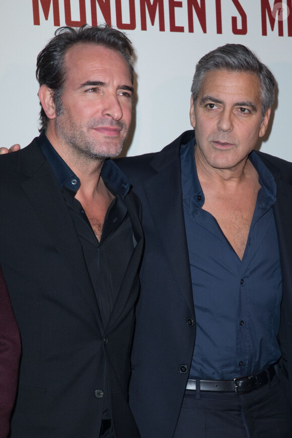 Jean Dujardin et George Clooney à Paris le 12 février 2014.
