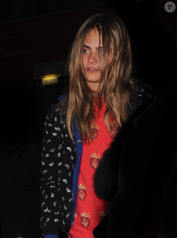 Cara Delevingne à la sortie du 11e anniversaire de Eleven Paris à la Gaité Lyrique à Paris, le 4 mars 2014.