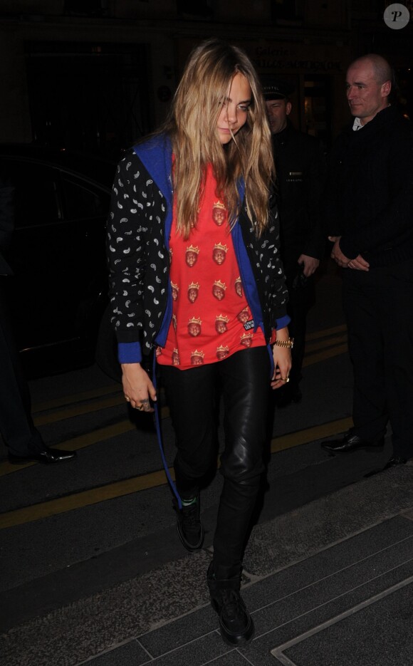 Cara Delevingne à la sortie du 11e anniversaire de Eleven Paris à la Gaité Lyrique à Paris, le 4 mars 2014.