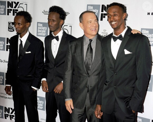 Barkhad Abdi, Mahat M. Ali, Tom Hanks et Faysal Ahmed lors de l'avant-première du film Capitaine Phillips à New York le 27 septembre 2013