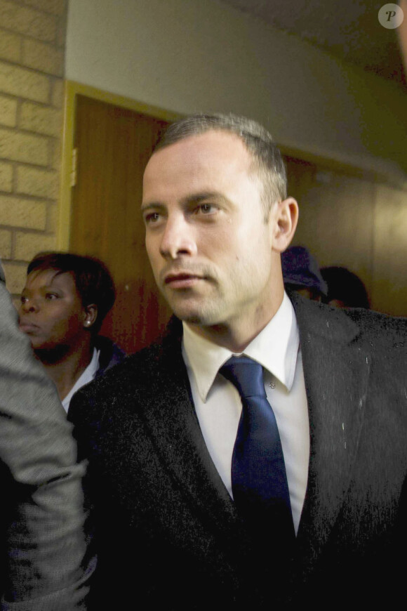 Oscar Pistorius lors de son deuxième jour de procès à Pretoria où il doit répondre du meurtre de Reeva Steenkamp, le 4 mars 2014