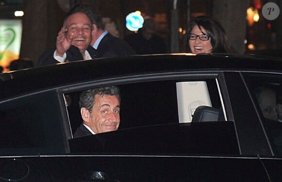 Nicolas Sarkozy à la sortie de l'Olympia après le concert de Carla Bruni, à Paris, le 11 mars 2014.