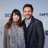 Christophe Michalak et son épouse Delphine McCarty enceinte, tout sourire lors de l'avant-première de Captain America : Le Soldat d'Hiver, au Grand Rex à Paris le 17 mars 2014