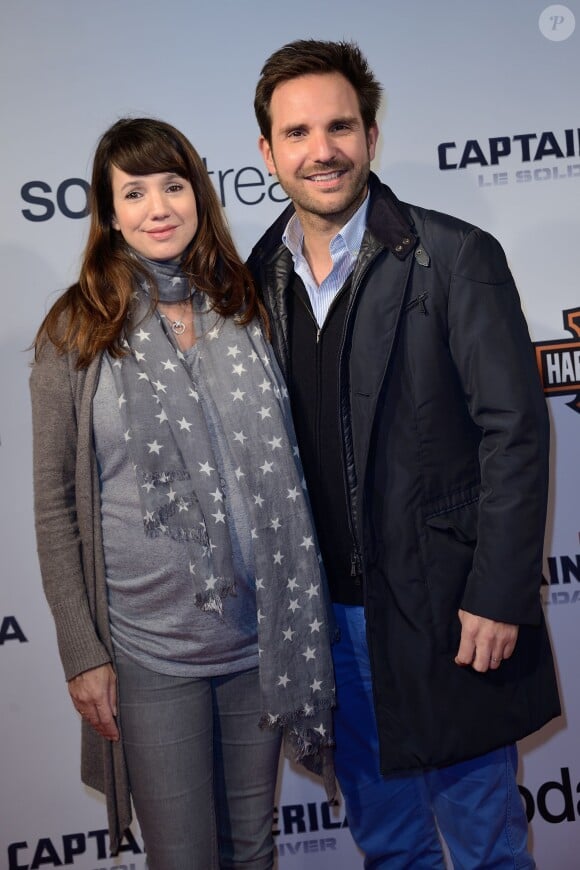 Christophe Michalak et son épouse enceinte Delphine McCarty lors de l'avant-première de Captain America : Le Soldat d'Hiver, au Grand Rex à Paris le 17 mars 2014
