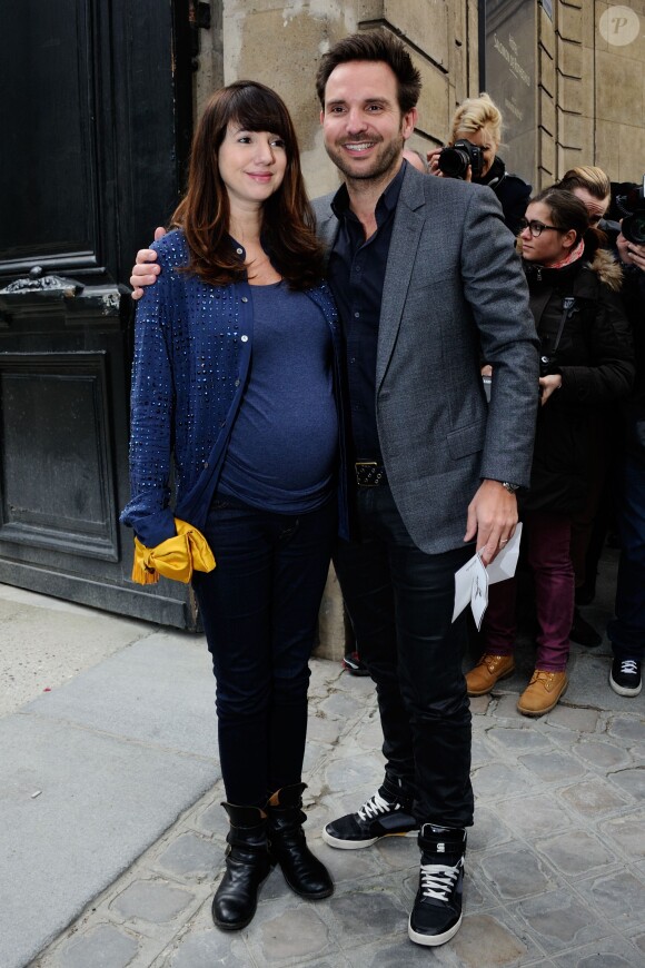 Christophe Michalak et Delphine McCarty lors du défilé Alexis Mabille à l'hôtel Salomon de Rothschild à Paris, le 26 février 2014