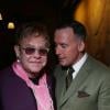 Elton John et David Furnish posent lors de la fashion week, à Londres, le 7 janvier 2014.