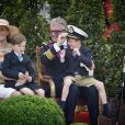  Le prince Laurent de Belgique et son épouse la prinesse Claire avec leurs jumeaux Nicolas et Aymeric lors de la Fête nationale le 21 juillet 2012, à Bruxelles. 