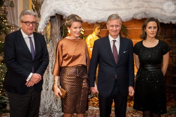 Le prince Laurent, la reine Mathilde, le roi Philippe et la princesse Claire de Belgique lors du concert de Noël 2013, le 11 décembre au palais royal à Bruxelles.