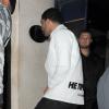 Drake arrive au Tramp pour son after-party. Il sera rejoint par Rihanna. Londres, le 25 mars 2014.