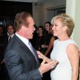 Arnold Schwarzenegger et Emma Thompson lors de la soirée Empire Magazine Film Awards à Londres le 30 mars 2014