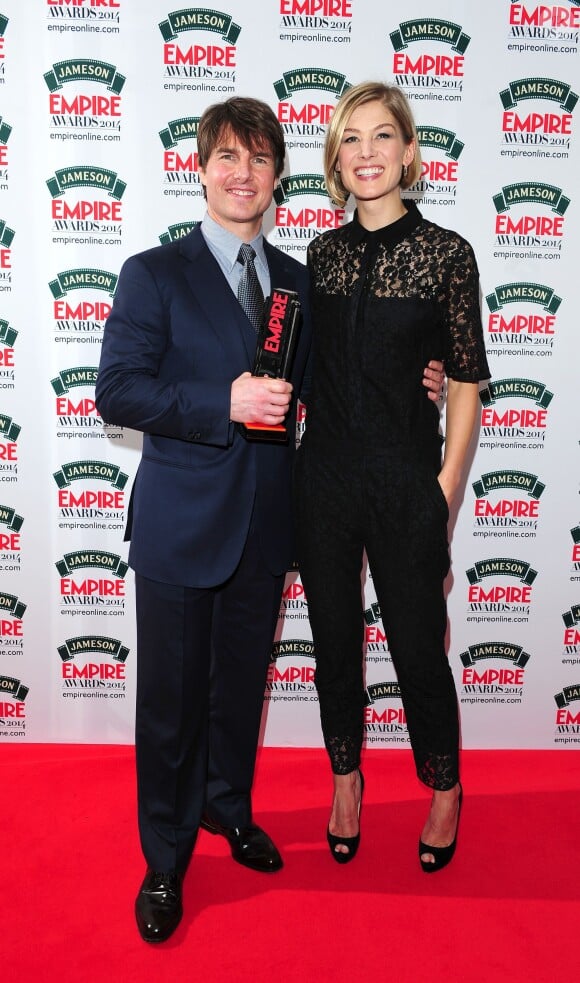 Tom Cruise avec Rosamund Pike lors de la soirée Empire Magazine Film Awards à Londres le 30 mars 2014