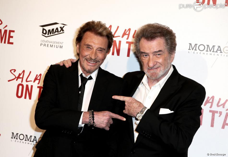 Johnny Hallyday et Eddy Mitchell complices à l&#039;avant-première du film Salaud on t&#039;aime à l&#039;UGC Normandie sur les Champs-Elysées à Paris le 31 mars 2014.