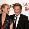 Johnny Hallyday et sa femme Laeticia, amoureux à l'avant-première du film Salaud on t'aime à l'UGC Normandie sur les Champs-Elysées à Paris le 31 mars 2014.