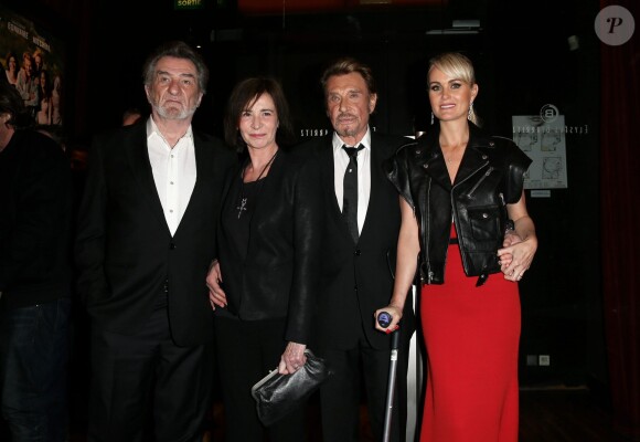 Eddy Mitchell et sa femme Muriel Bailleul, Johnny Hallyday et sa femme Laeticia à l'avant-première du film Salaud on t'aime à l'UGC Normandie sur les Champs-Elysées à Paris le 31 mars 2014.