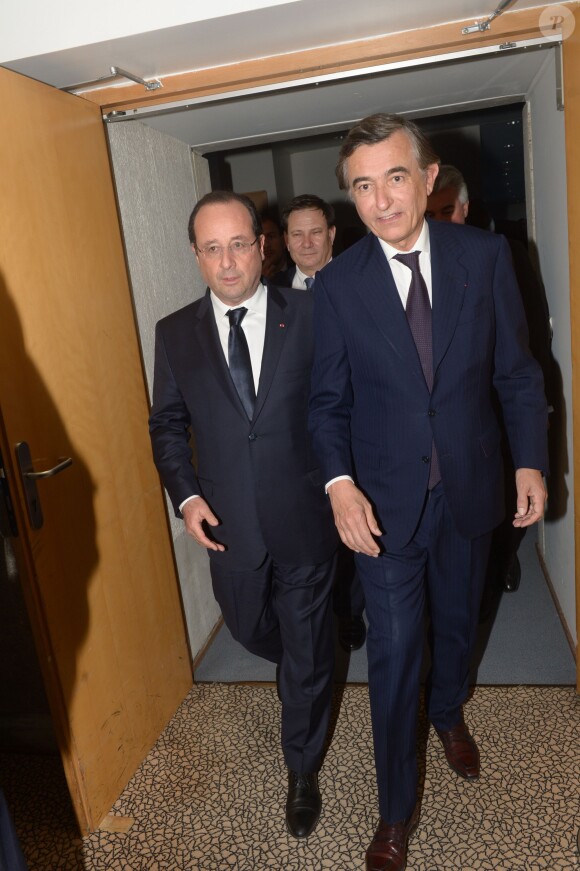François Hollande et Philippe Douste-Blazy au dîner en l'honneur d'UNITAID au Conseil économique, social et environnemental à Paris, le 1er avril 2014.