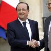 François Hollande reçoit Bill Gates au palais de l'Elysée à Paris. Le 1er avril 2014.