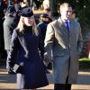Peter Phillips et sa femme Autumn à Sandringham le 25 décembre 2013, de sortie avec la famille royale pour la messe de Noël.