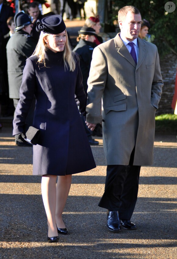 Peter Phillips et sa femme Autumn à Sandringham le 25 décembre 2013, de sortie avec la famille royale pour la messe de Noël.