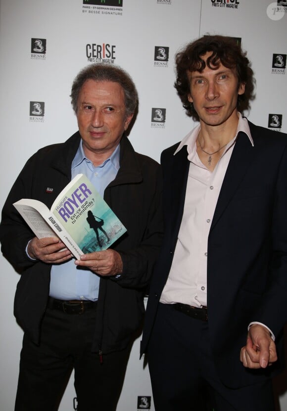 Michel Drucker, Hugues Royer - Lancement du nouveau roman d'Hugues Royer 'Est-ce que tu m'entends ?' à l'hôtel Bel-Ami, à Paris, le 10 avril 2014.