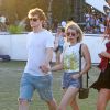 Emma Roberts et son compagnon Evan Peters lors du 3ème jour du festival de Coachella, le 13 avril 2014.