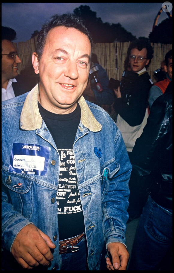 Archives - Coluche lors d'une manifestation "Touche pas à mon poste", en 1985.