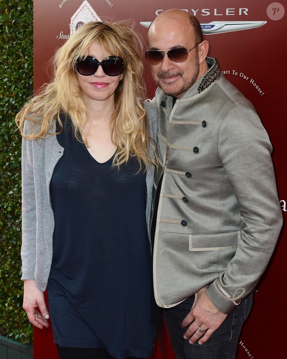 Courtney Love et John Varvatos assistent à la 11e édition de la soirée caritative de John Varvatos, au profit de la Stuart House. Los Angeles, le 13 avril 2014.
