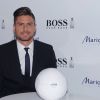 Olivier Giroud, nouvel ambassadeur du parfum Boss Bottled, était de passage à Paris chez Marionnaud pour une rencontre dédicace avec ses fans, le 17 avril 2014