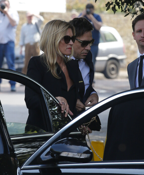 Kate Moss assiste aux funérailles de Peaches Geldof à Davington dans le Kent, le 21 avril 2014.