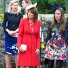 Carole Middleton était superbe en rouge et beige au mariage de Rowena Macrae, très bonne amie de sa fille Pippa, et Julian Osborne à Pertshire, en Ecosse, le 26 avril 2014.