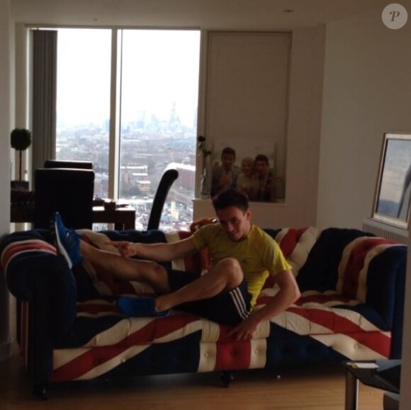 Tom Daley dans son appartement londonien, le 4 mars 2014.