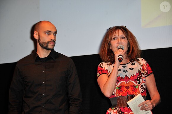 Clémentine Célarié avec son fils Abraham lors du Festival Atmosphere à Courbevoie le 2 Avril 2013.